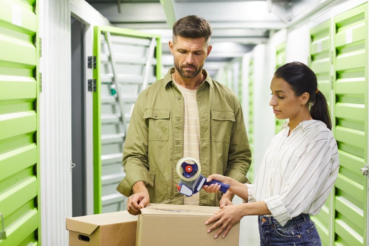 couple at self storage facility