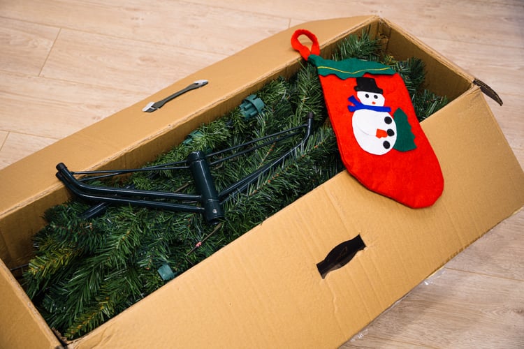 christmas tree and stocking in a storage box